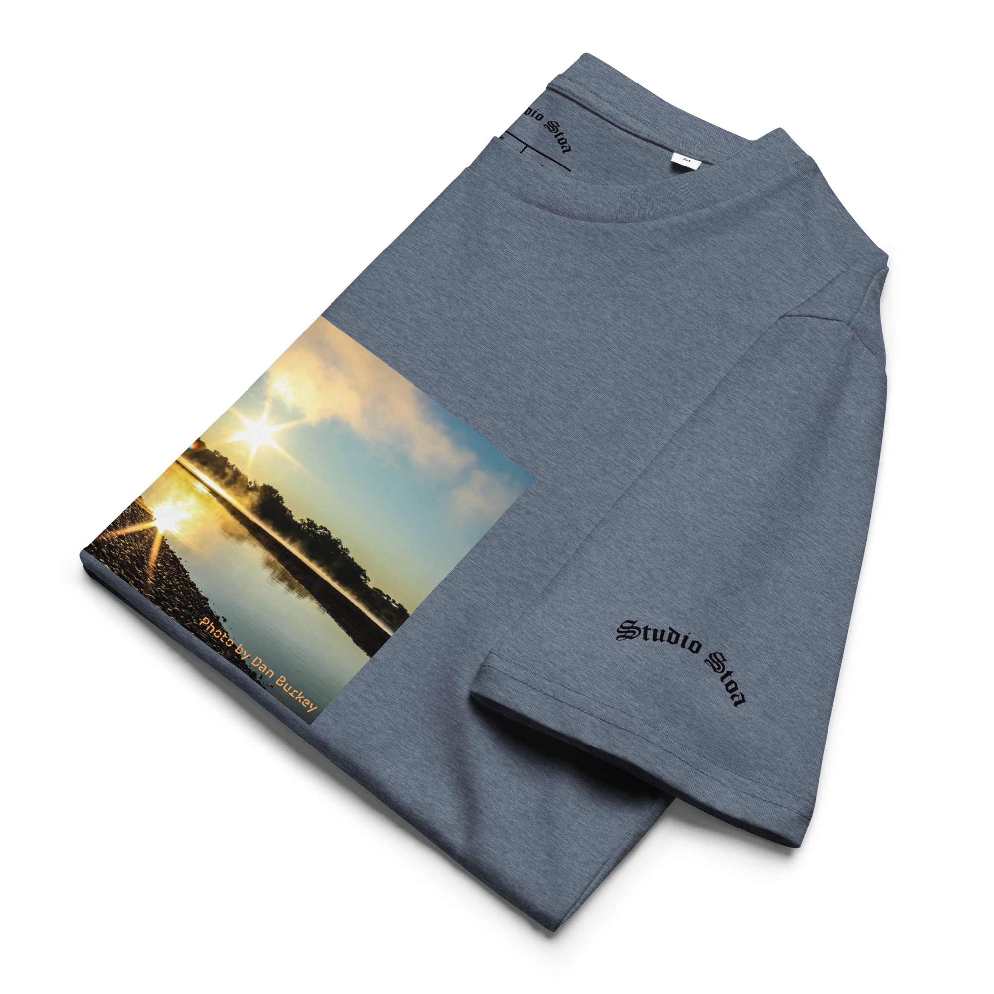 Dark heather blue color folded Studio Stoa theoria collection yellowstone river sunrise photo graphic tee 