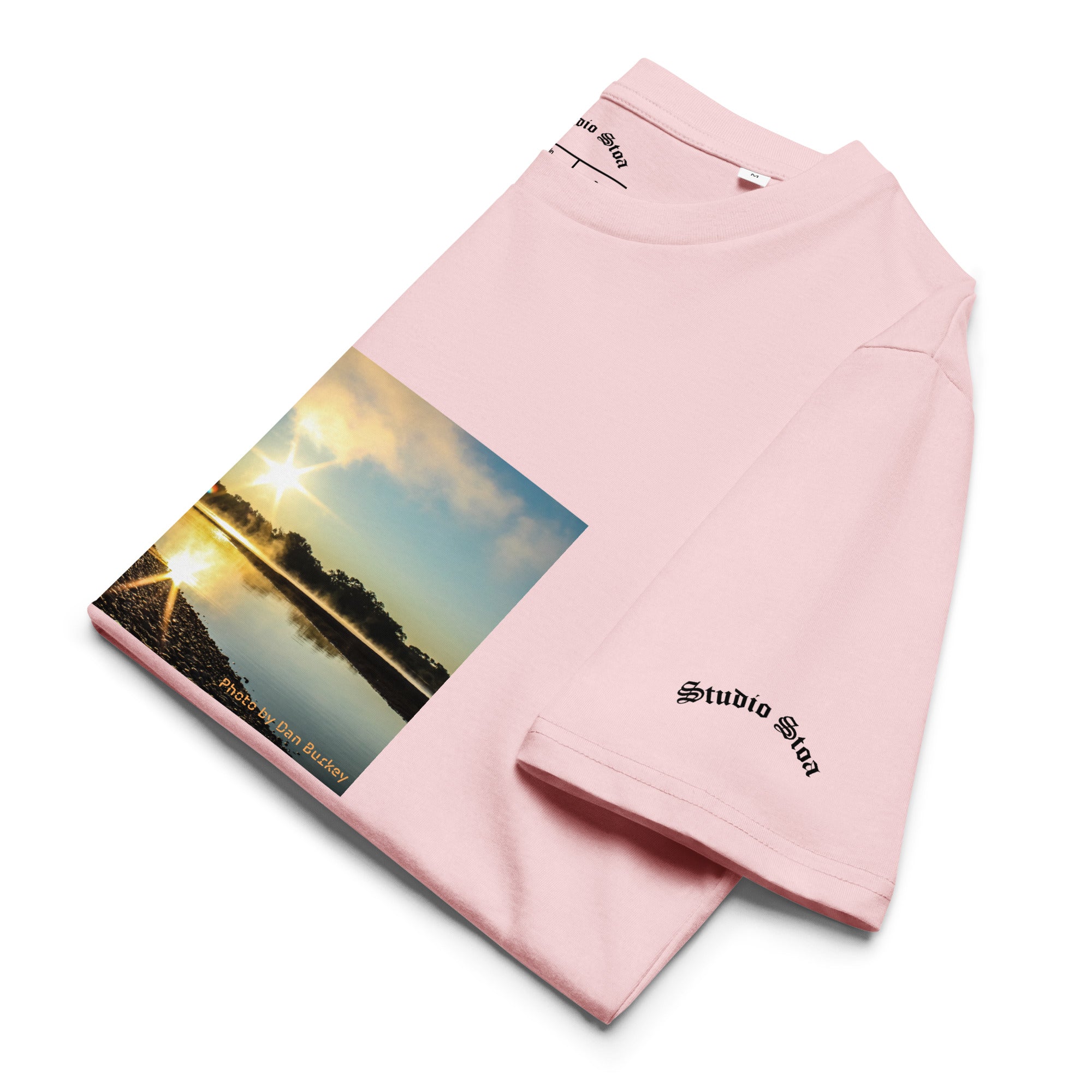 pink color folded Studio Stoa theoria collection yellowstone river sunrise photo graphic tee 