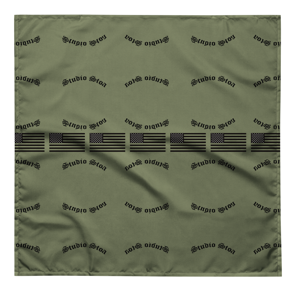 An olive green square scarf featuring a horizontal black-and-white American flag stripe pattern across the center, with a repeating black 'studio 1912' logo printed all over the fabric.