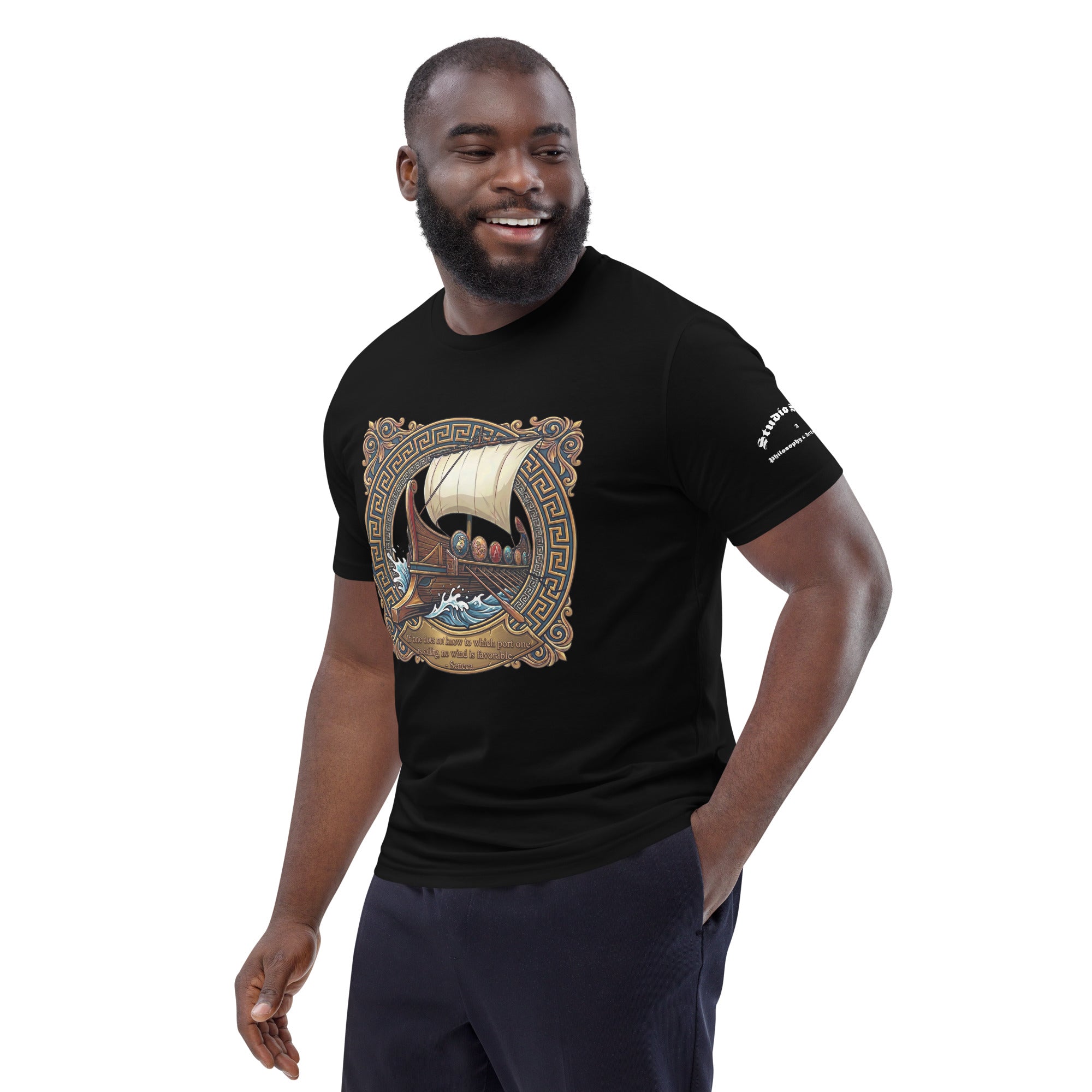 male model wearing a black tee with ship graphic and a quote from Seneca