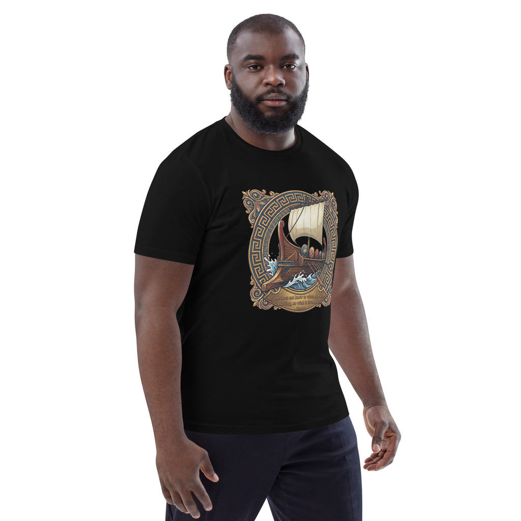 Male model wearing a black tee with ship graphic and a quote from Seneca facing front right