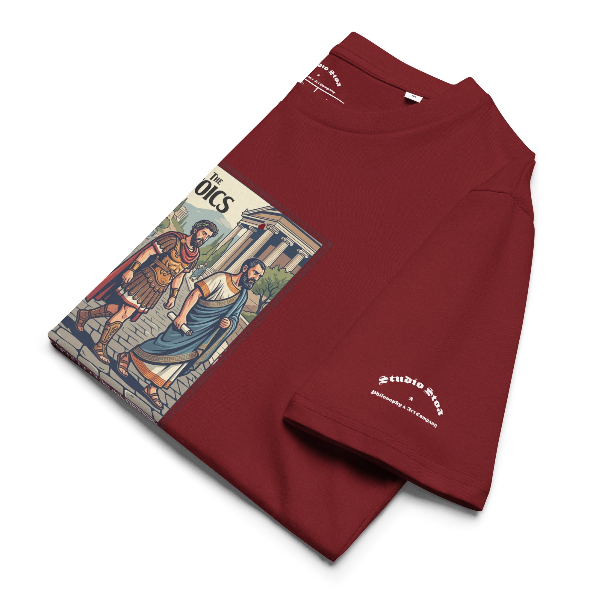 Red folded t-shirt with a graphic of ancient philosophers and 'The Stoics' text on a white background