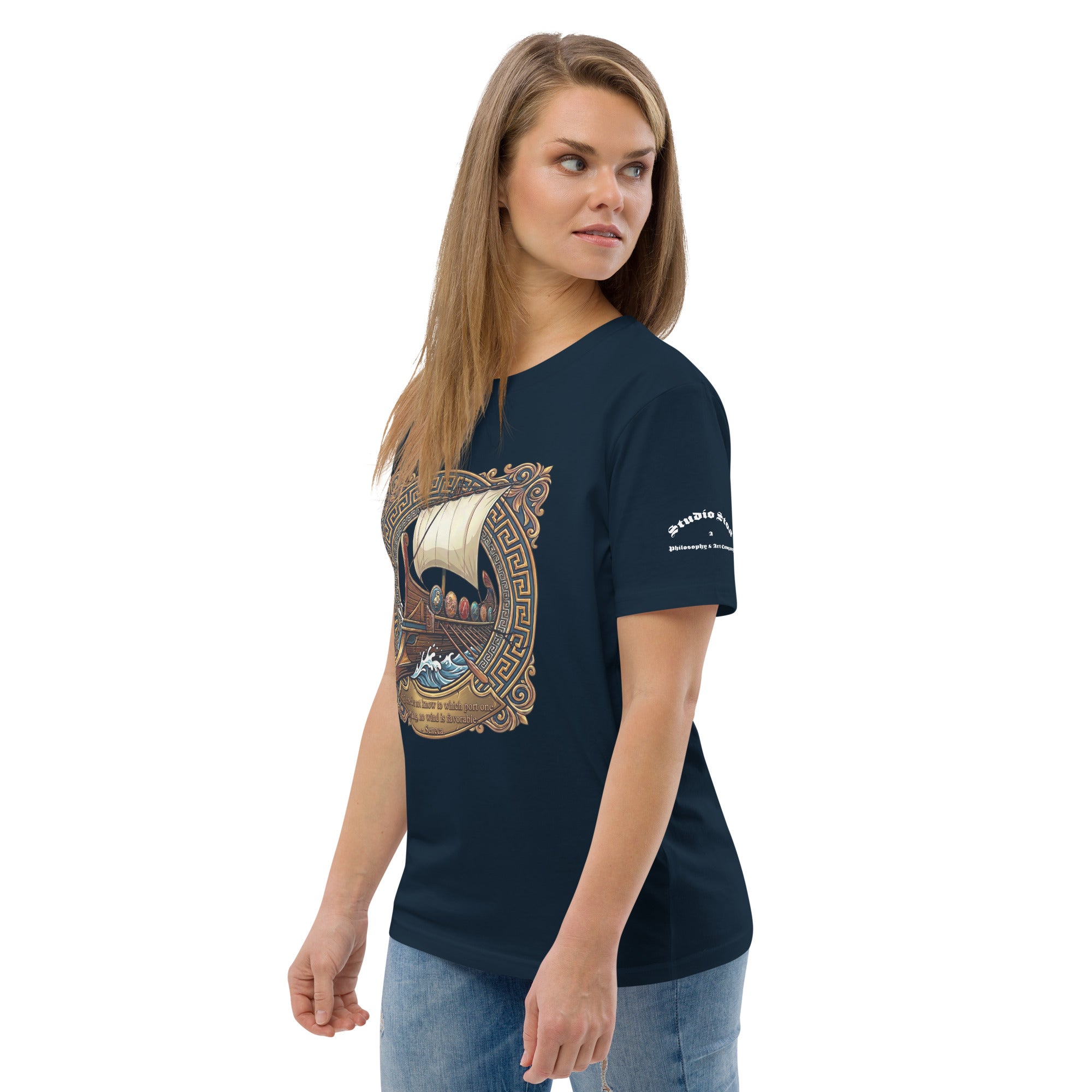 woman wearing a navy blue tee with ship graphic and a quote from Seneca