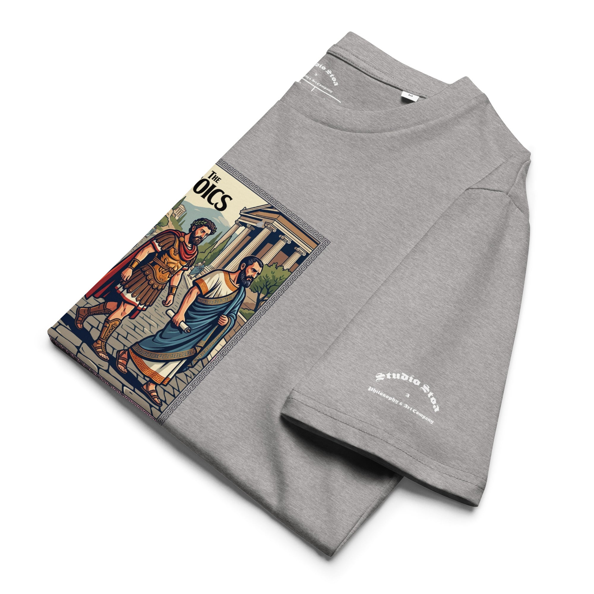 light gray folded t-shirt with a graphic of ancient philosophers and 'The Stoics' text on a white background